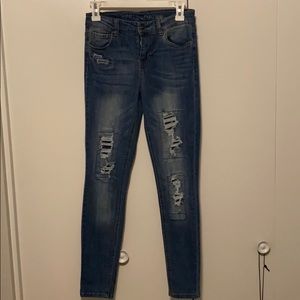 Vanilla Star mid- rise Skinny Jeans size 9